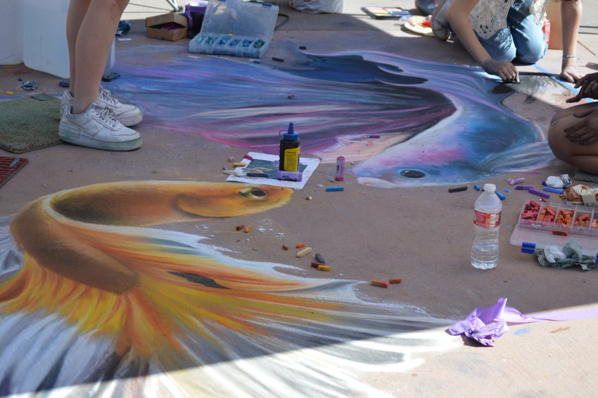 Artwork created by Highlands Ranch High School artists on Sept. 24 as part of the Centennial Chalk Art Festival at The Streets at SouthGlenn.